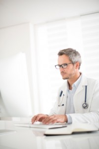 young doctor at his office